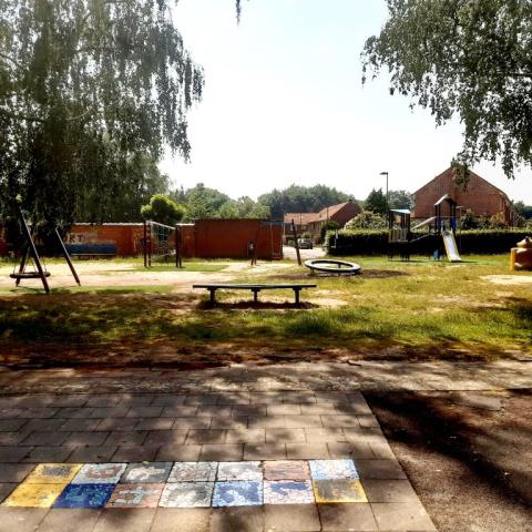 Speeltuin aan wijkhuis Battel