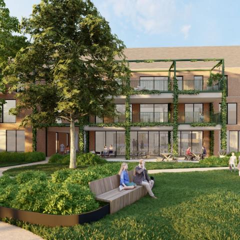 Een toekomstbeeld van de binnentuin met een beeld op de het gebouw.